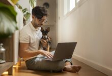 person working from home with pet dog scaled 1 1