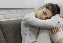 woman looking sad as she works from home with copy space