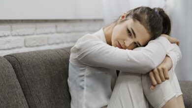 woman looking sad as she works from home with copy space